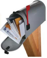 mailbox overfilled with mail image.